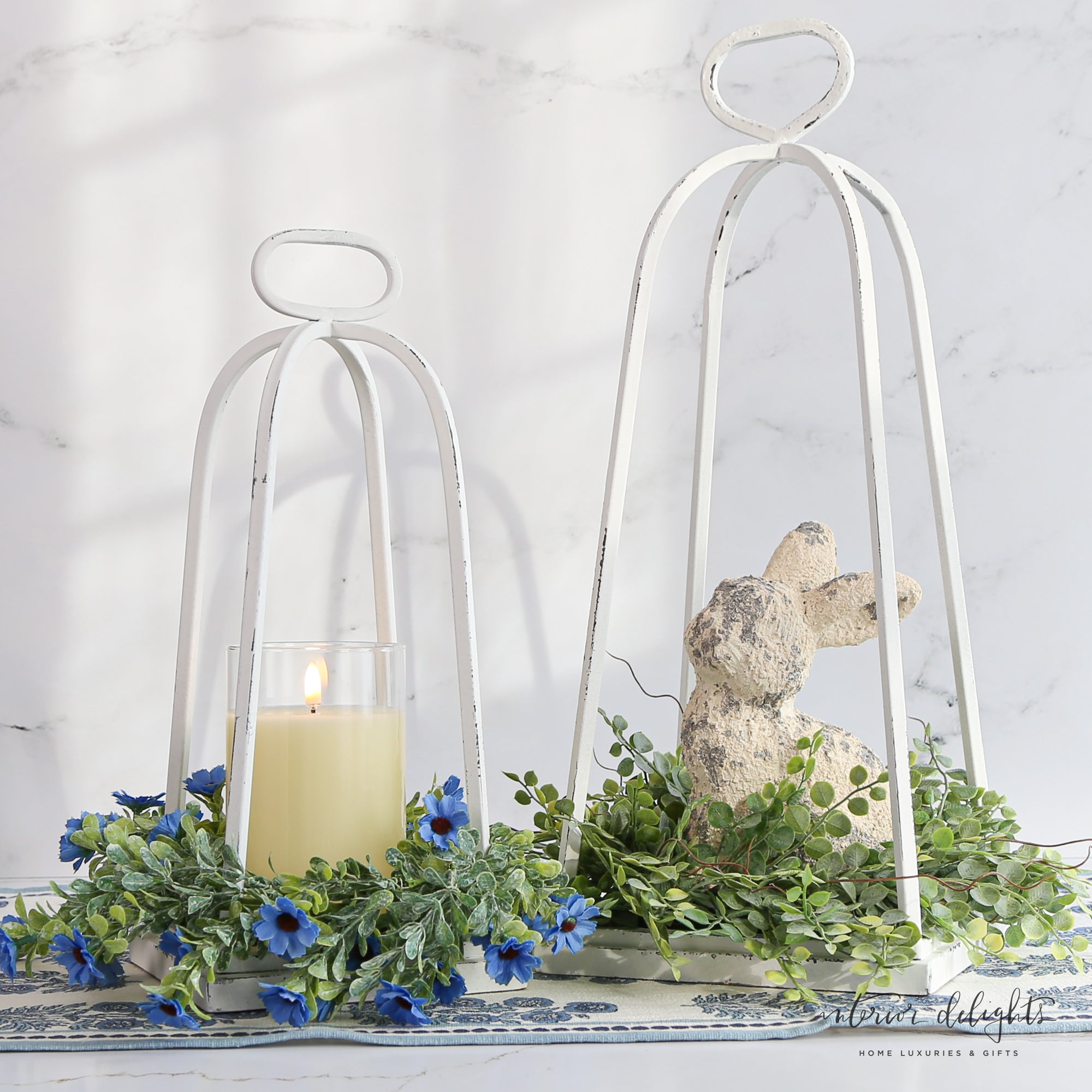 Hilltop Bunny displayed on a table among spring florals, ideal for Easter.