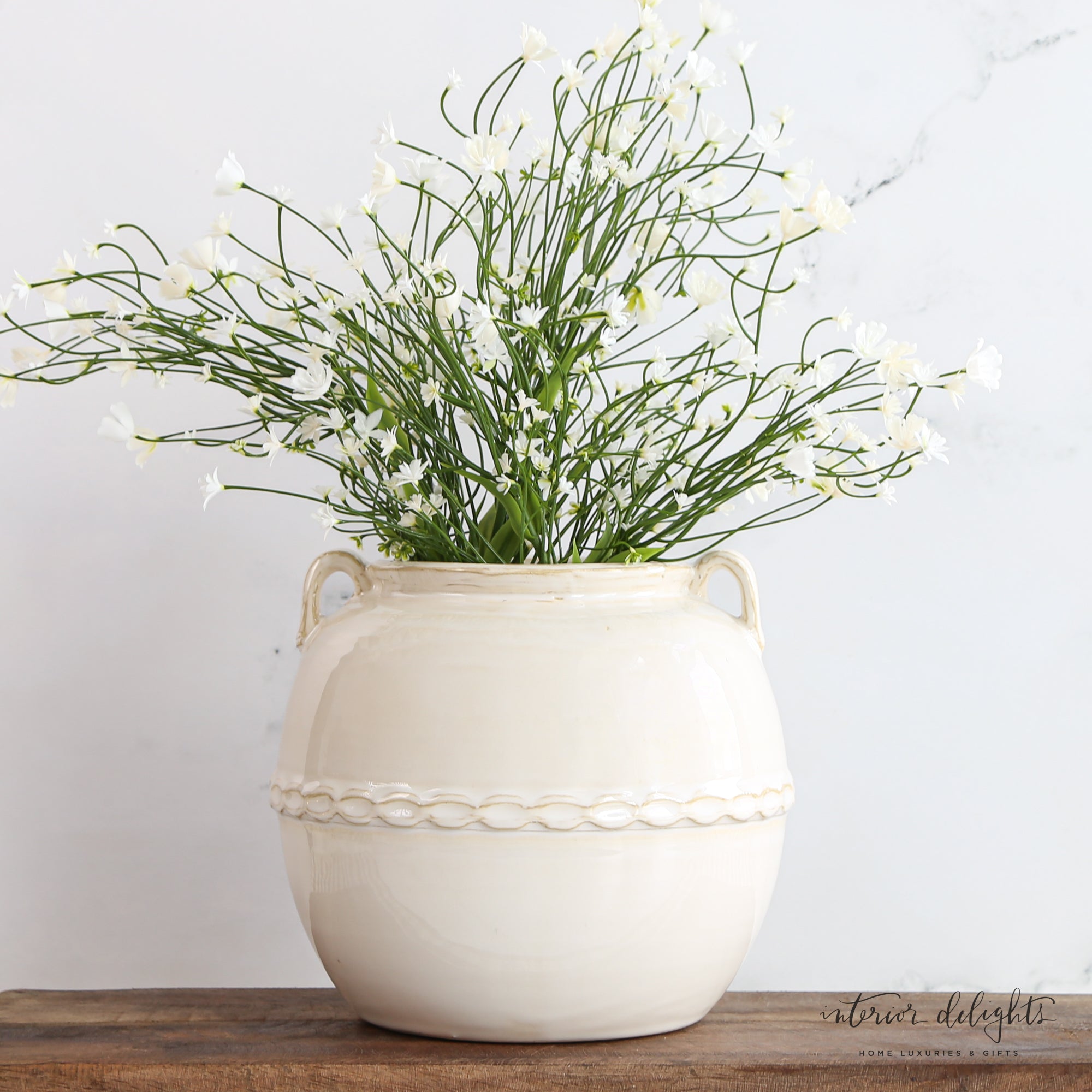 Stylish 8” Cream Braided Vase featuring a classic silhouette, great as a standalone accent or with arrangements.