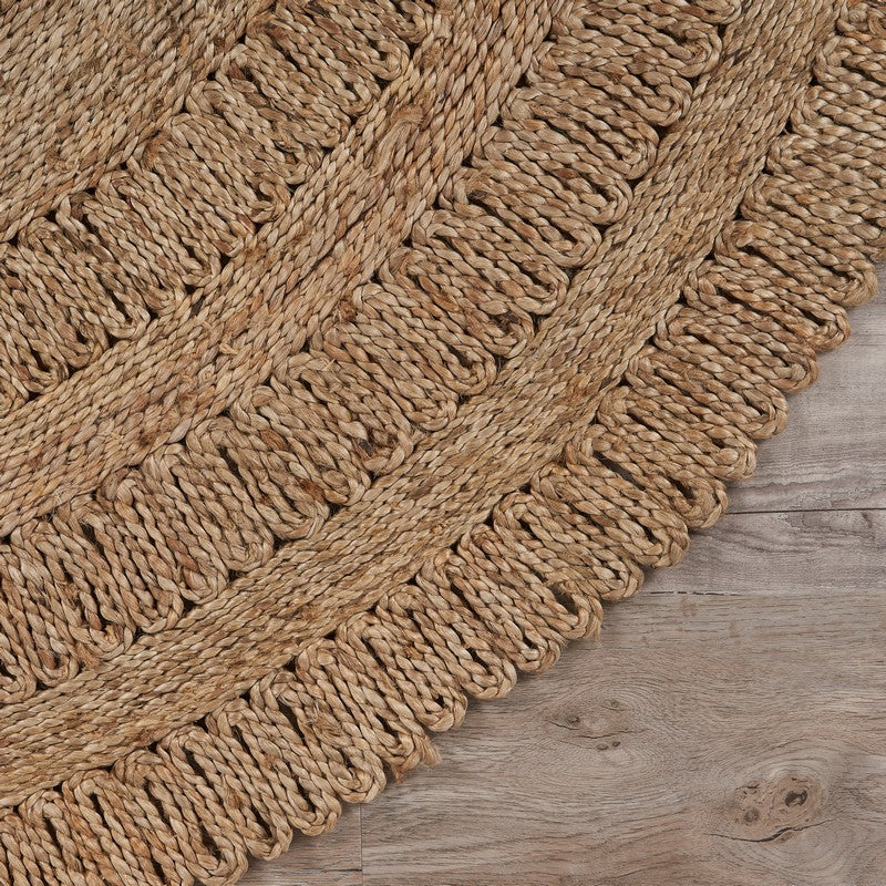 Scallop Grey Natural Fiber Rug in a round shape, perfect for enhancing indoor decor.