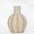 7" Matte Straw Stripe Ceramic Vase showcasing its speckled texture and subtle vertical stripes for a charming cottage decor accent.