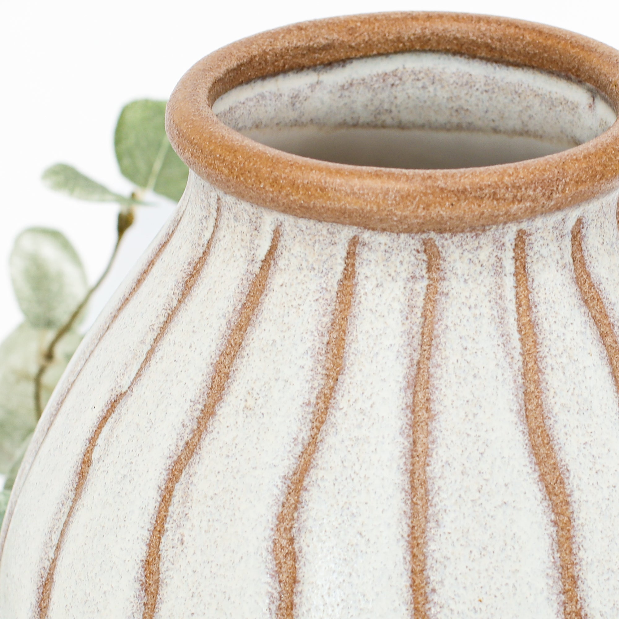 7" Beige Stripe Ceramic Vase showcasing subtle light brown lines and a textured cream glaze, perfect for home decor.