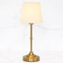 Rechargeable Gold LED Tap Lamp with warm ambient glow, featured on a nightstand.