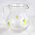 Lemon Print Bubble Glass Pitcher, a cheerful handblown glass pitcher with a lemon design, perfect for serving drinks like lemonade and summer sangria.