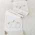 Embroidered Pumpkin Table Runner - 72in with cream base and beige and white stitching, featuring cozy tassels, perfect for fall decor.
