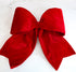 Large Red Outdoor Velvet Bow displayed on a festive door, perfect for adding a bold statement to your holiday decorations.