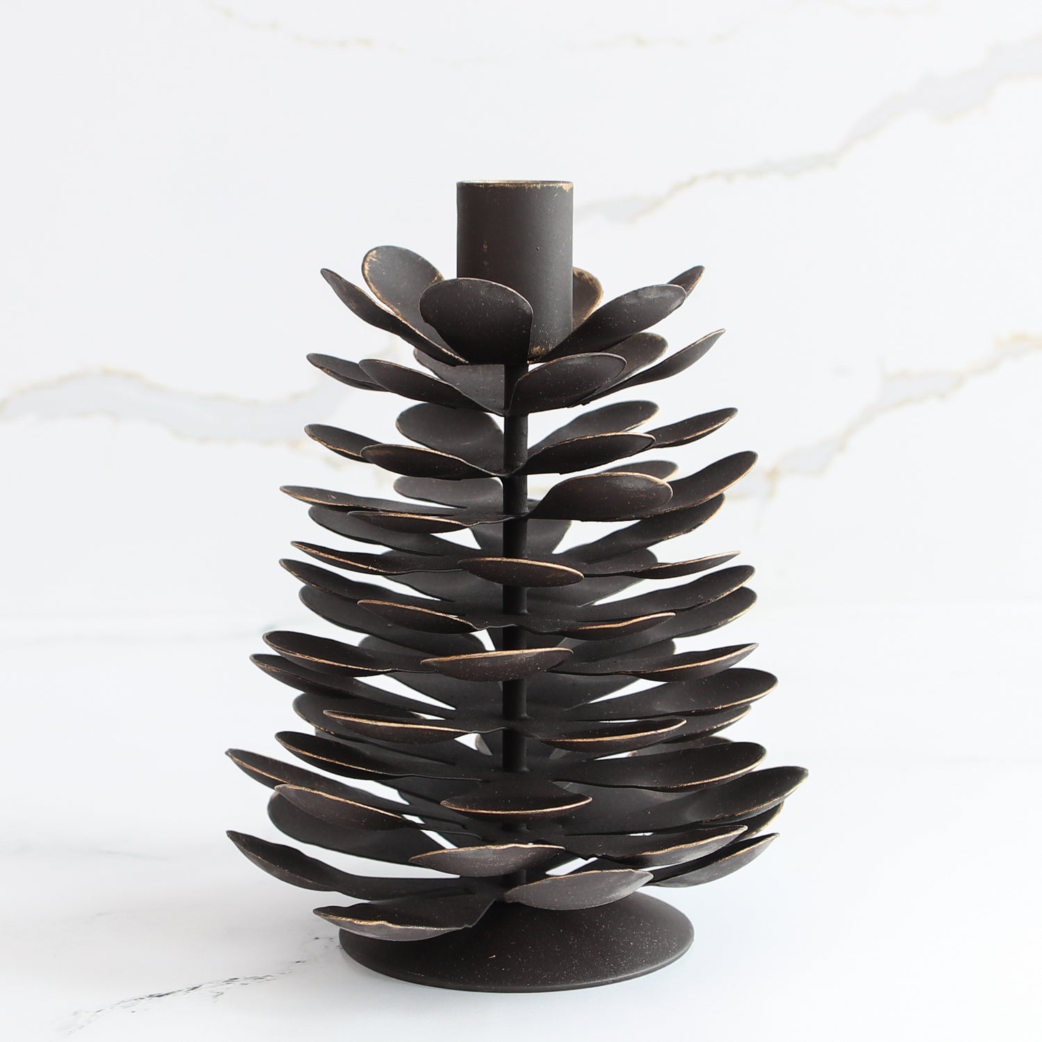 Small Iron Pinecone Candle Holder showcasing detailed pinecone design, perfect for rustic decor.