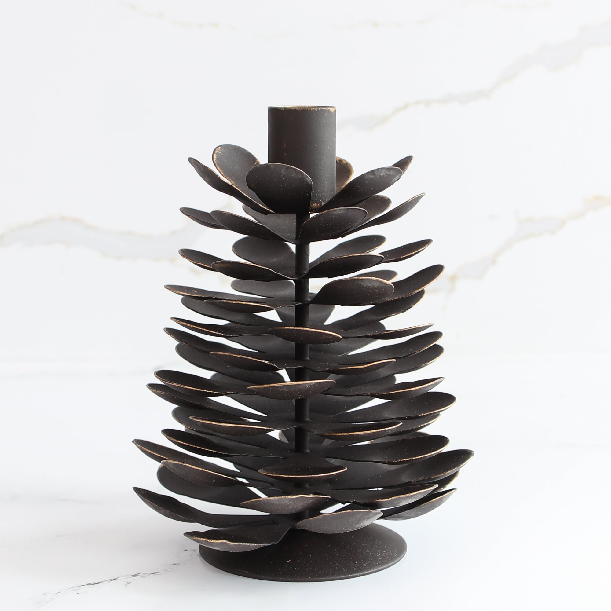 Small Iron Pinecone Candle Holder showcasing detailed pinecone design, perfect for rustic decor.