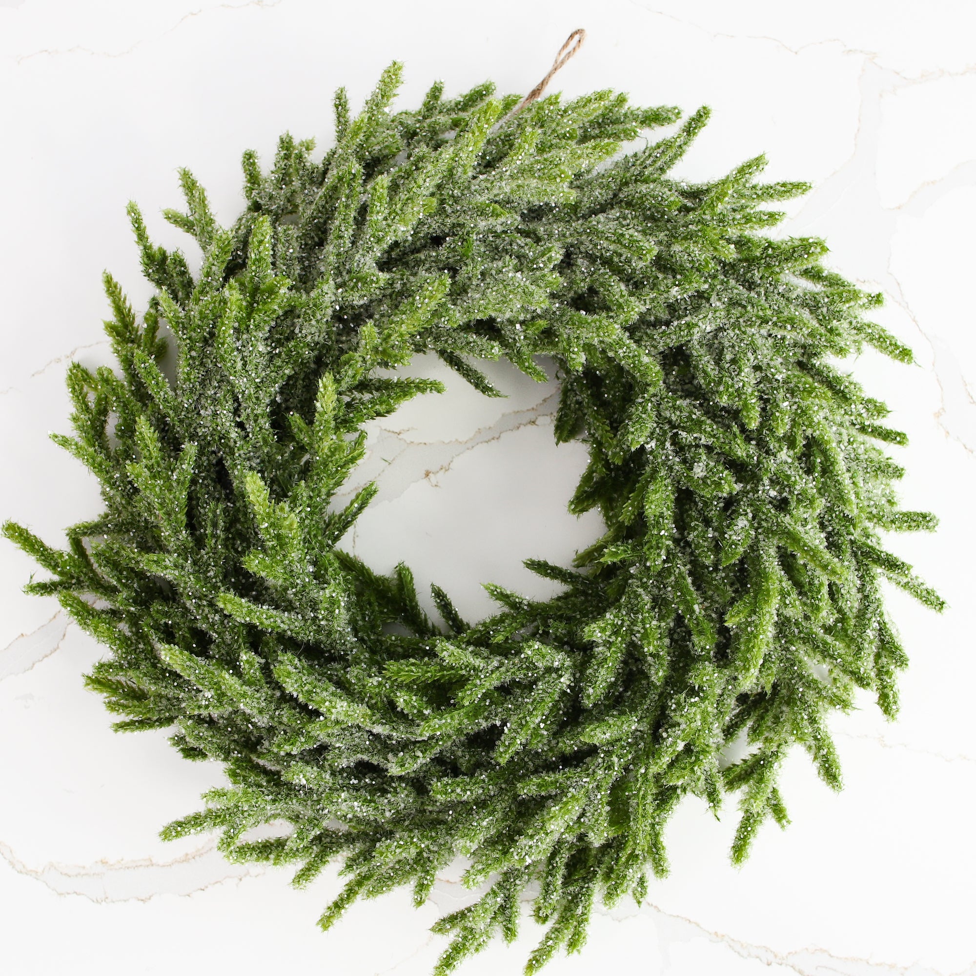 ARRANGEMENT: Sled Risers with Pinecones and Glitter Wreaths