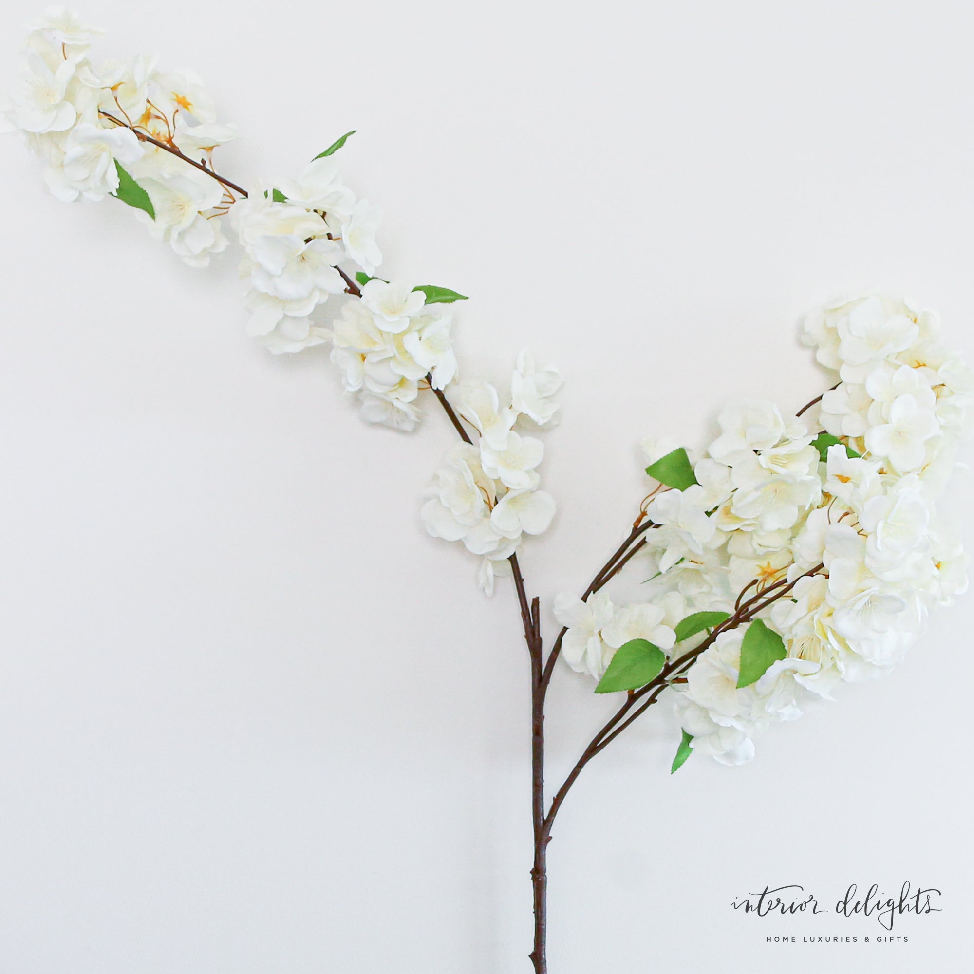 Beautiful Cherry Blossom Spray - 44in featuring delicate white flowers perfect for enhancing interior spaces.