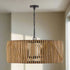 Monica - Wave Pattern Wood 6 Light Chandelier showcasing unique sculptural design with mango wood slats and matte black metal frame.