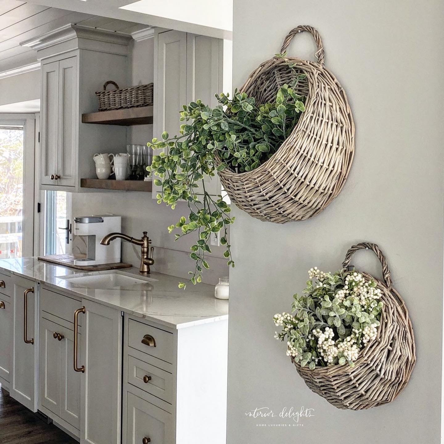 Decorative Set of 2 Round Willow Baskets displaying rustic charm with greenery and floral accents.