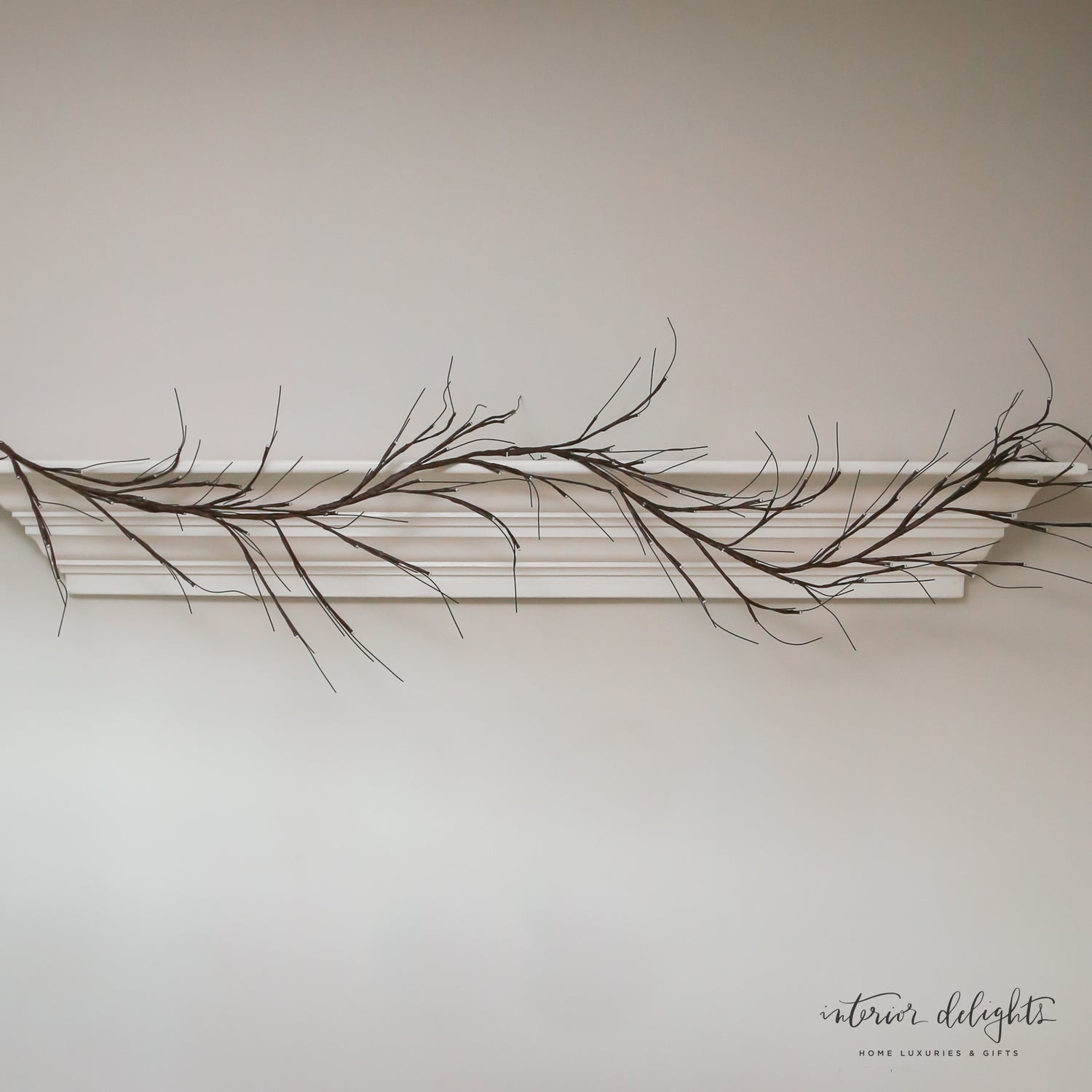 7ft LED-Twiggy Lit Garland showcasing its beautiful twinkling lights and natural texture, perfect for mantels or banisters.