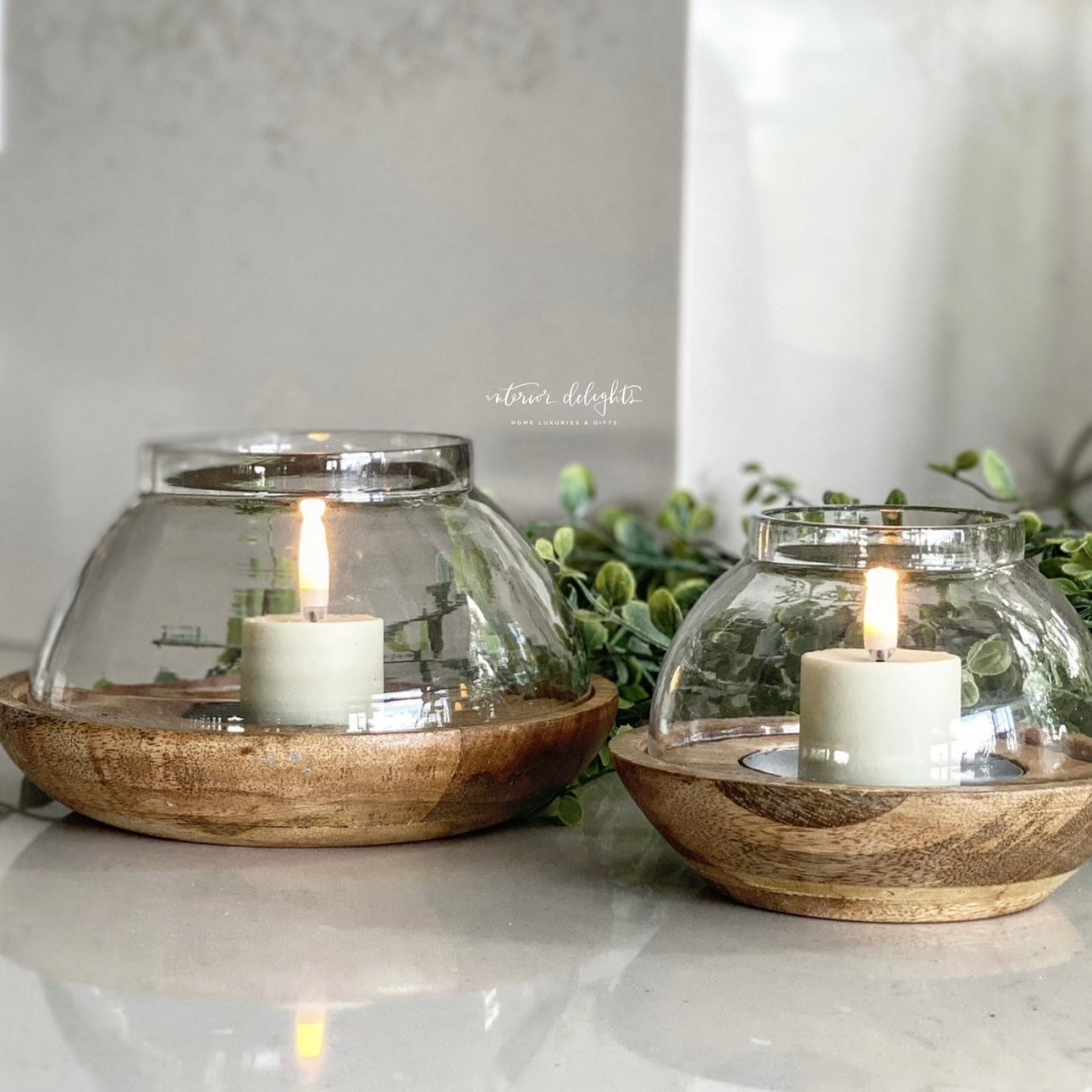 Set of 2 Wood and Glass Candle Holders displayed elegantly, ideal for adding warmth to your home decor.