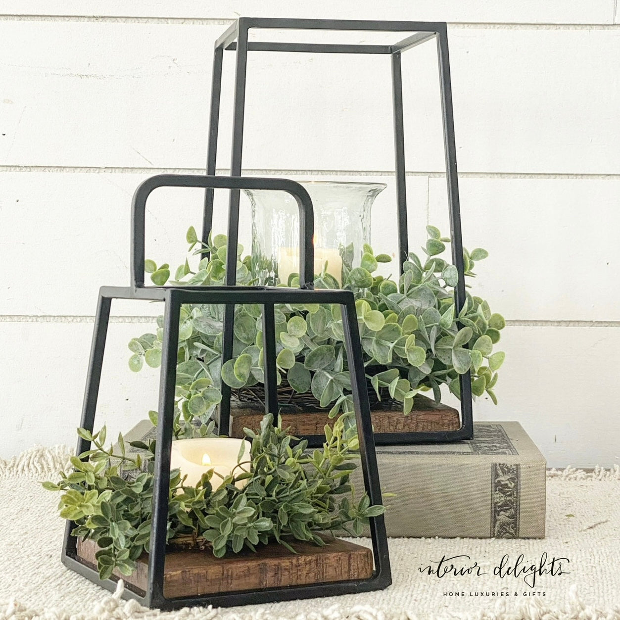 Close-up of Mini Lantern Set highlighting the intricate black iron finish.