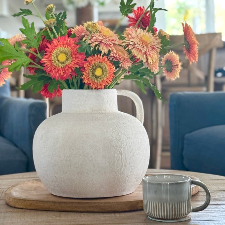 Close-up of the 10” Luxe Heavy Textured White Handle Vase highlighting its weathered look and timeless design.