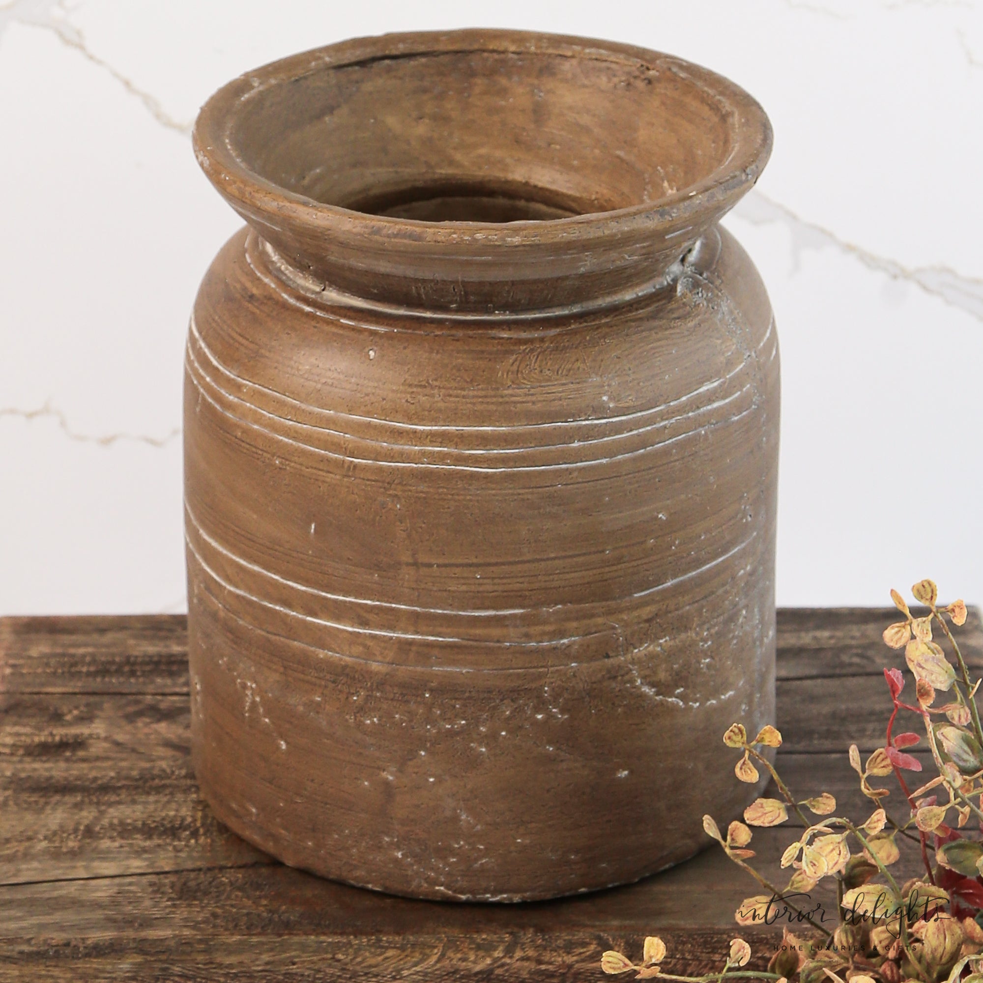 Dimensions of the 9" Brown Line Vase, measuring 7.5" diameter by 9" height, ideal for various floral displays.