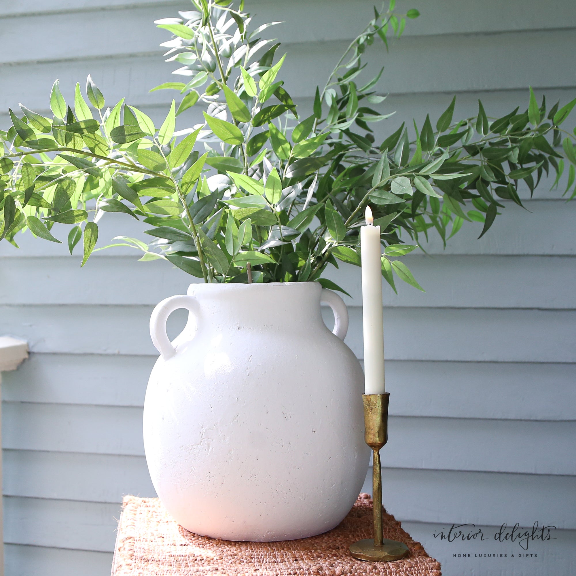 Close-up of the 12” White Two Handle Jug Vase highlighting its textured surface and minimalist design.
