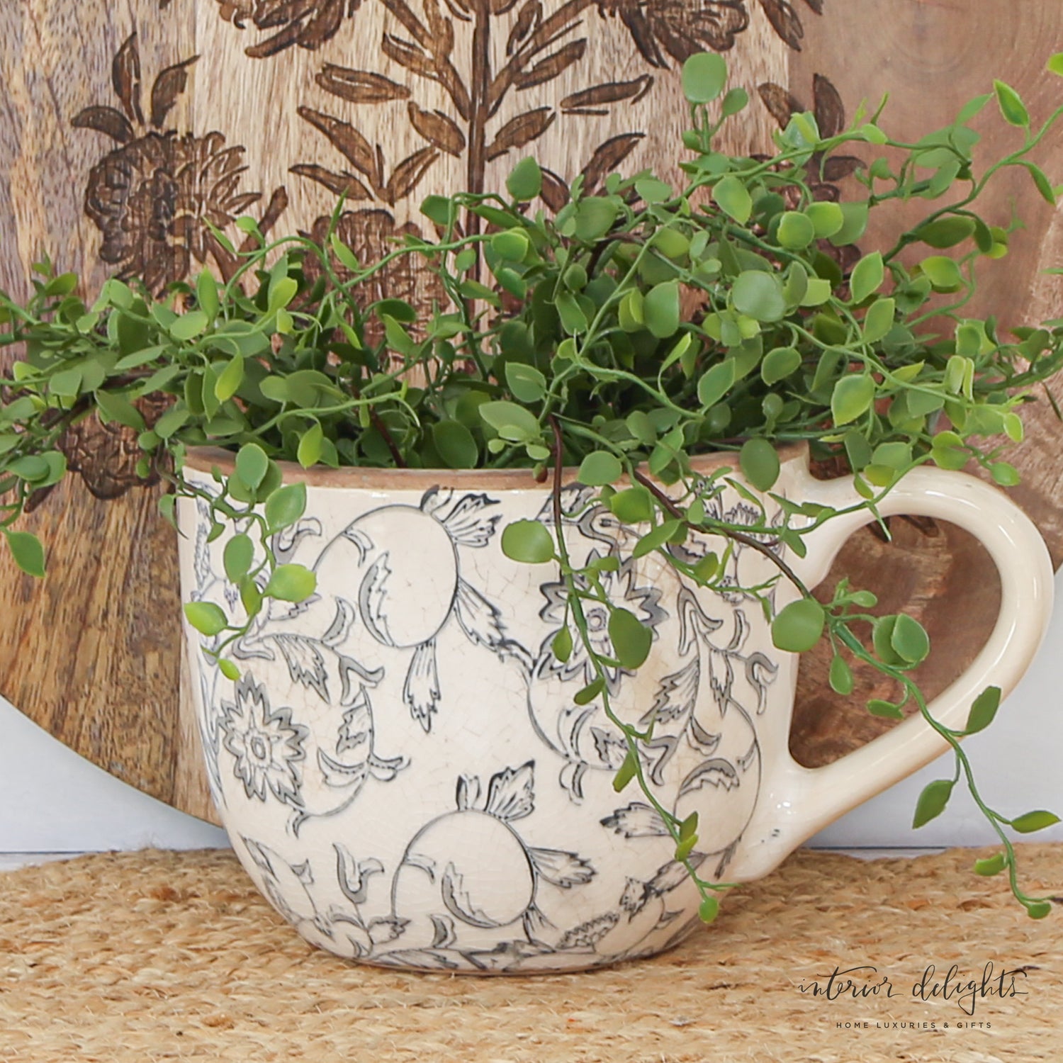 5" Beige Heirloom Tea Cup Planter showcasing vintage charm with intricate glaze pattern, perfect for displaying flowers in whimsical decor.