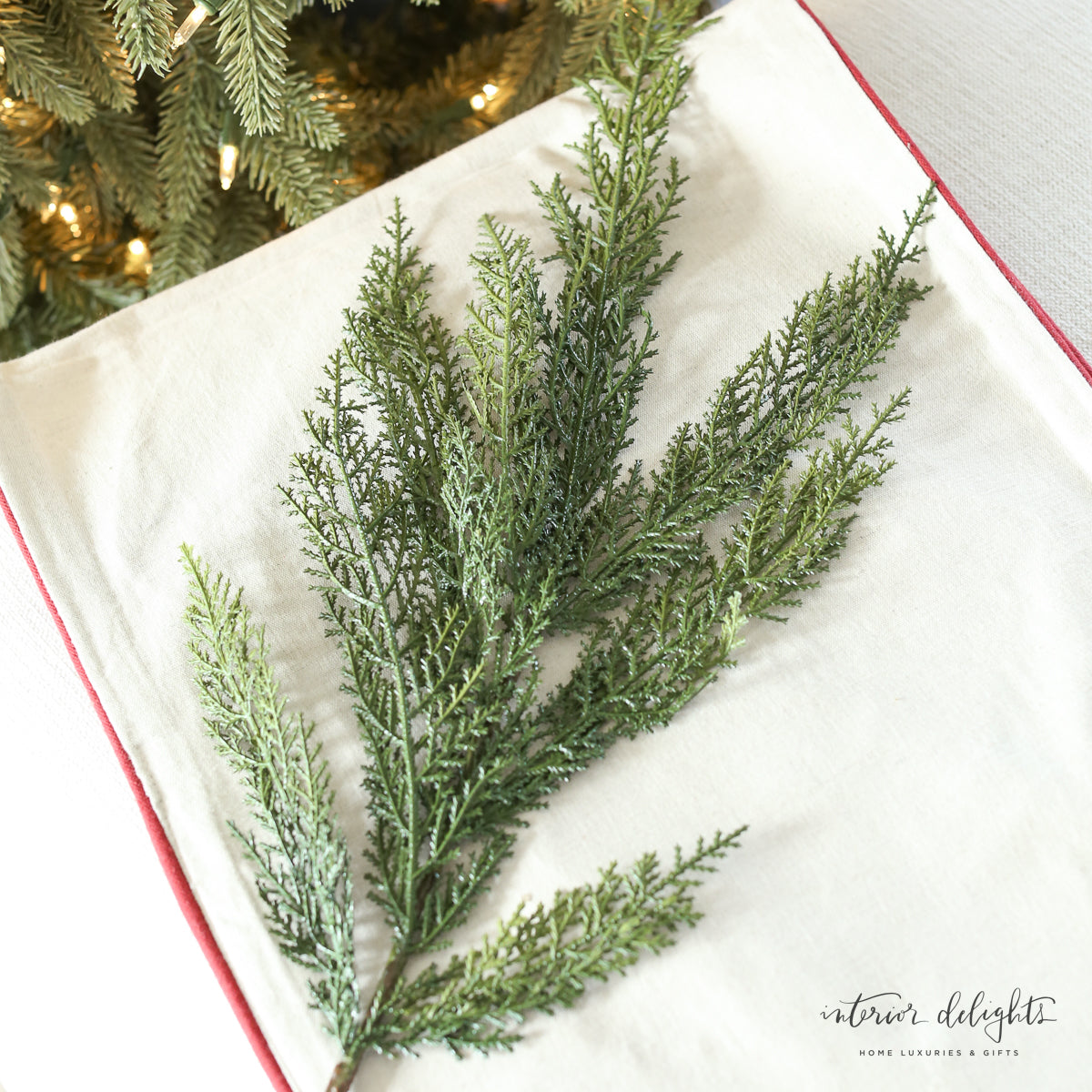 30" Cedar Spray arranged beautifully in a decorative bowl, adding warmth and coziness to home decor.