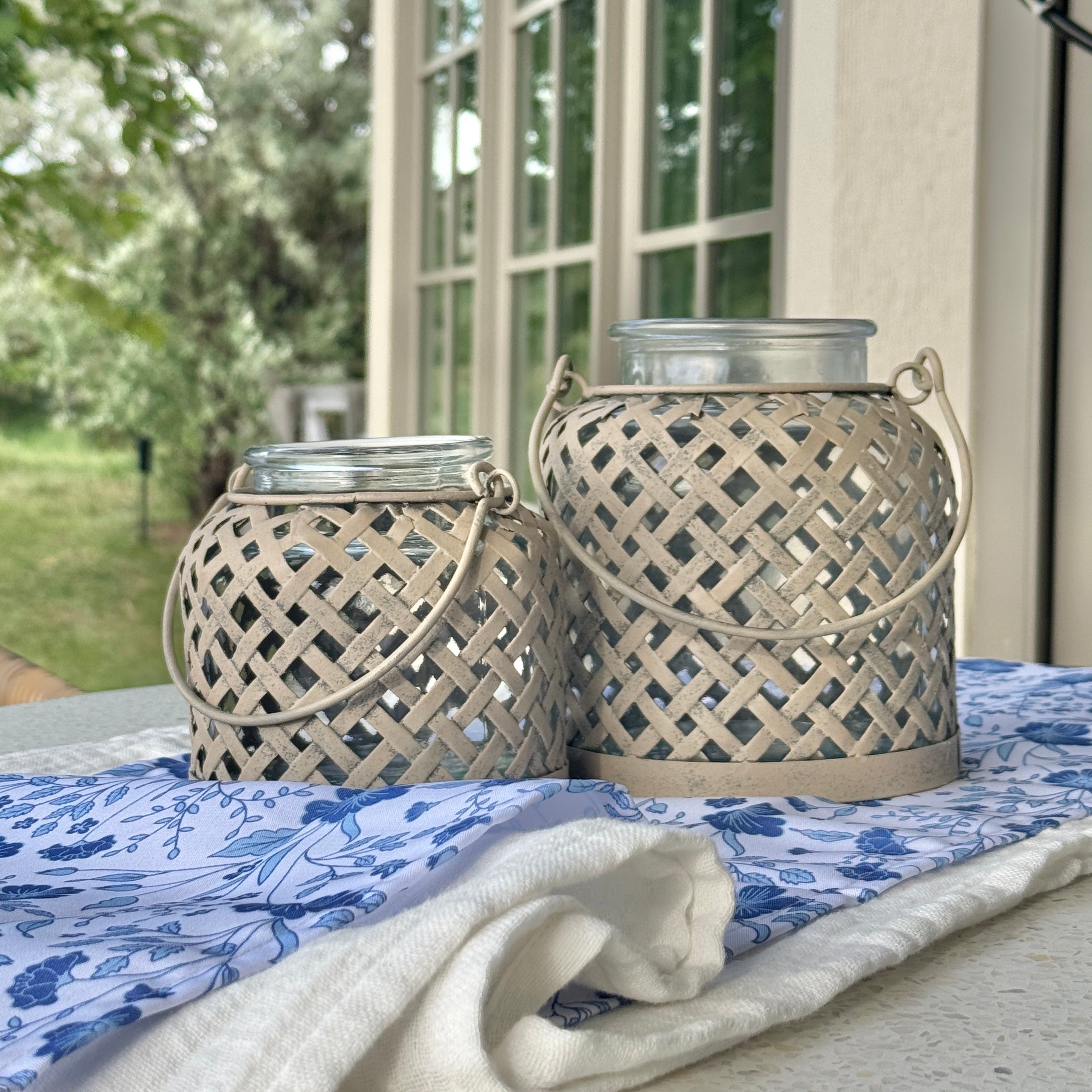 Elegant glass Lattice Lanterns with a movable handle, ideal for tabletop display or hanging, showcasing your favorite candles.
