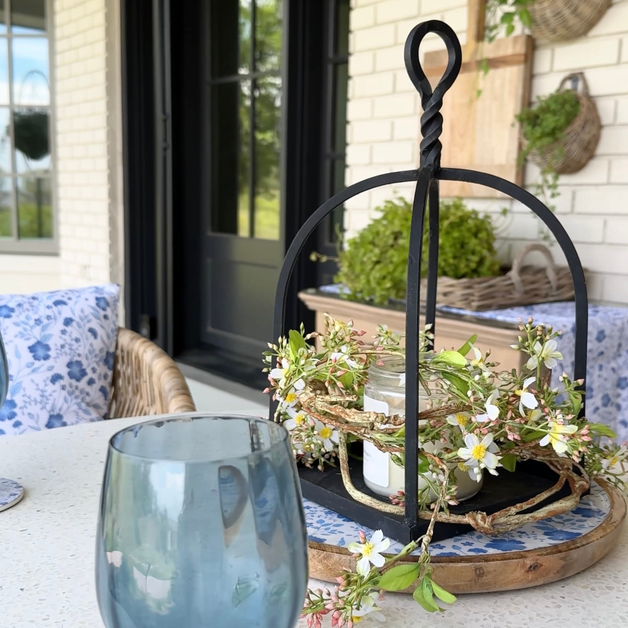 Styled 5ft Mini flower Garland draped over a rustic mantel with charming decor.