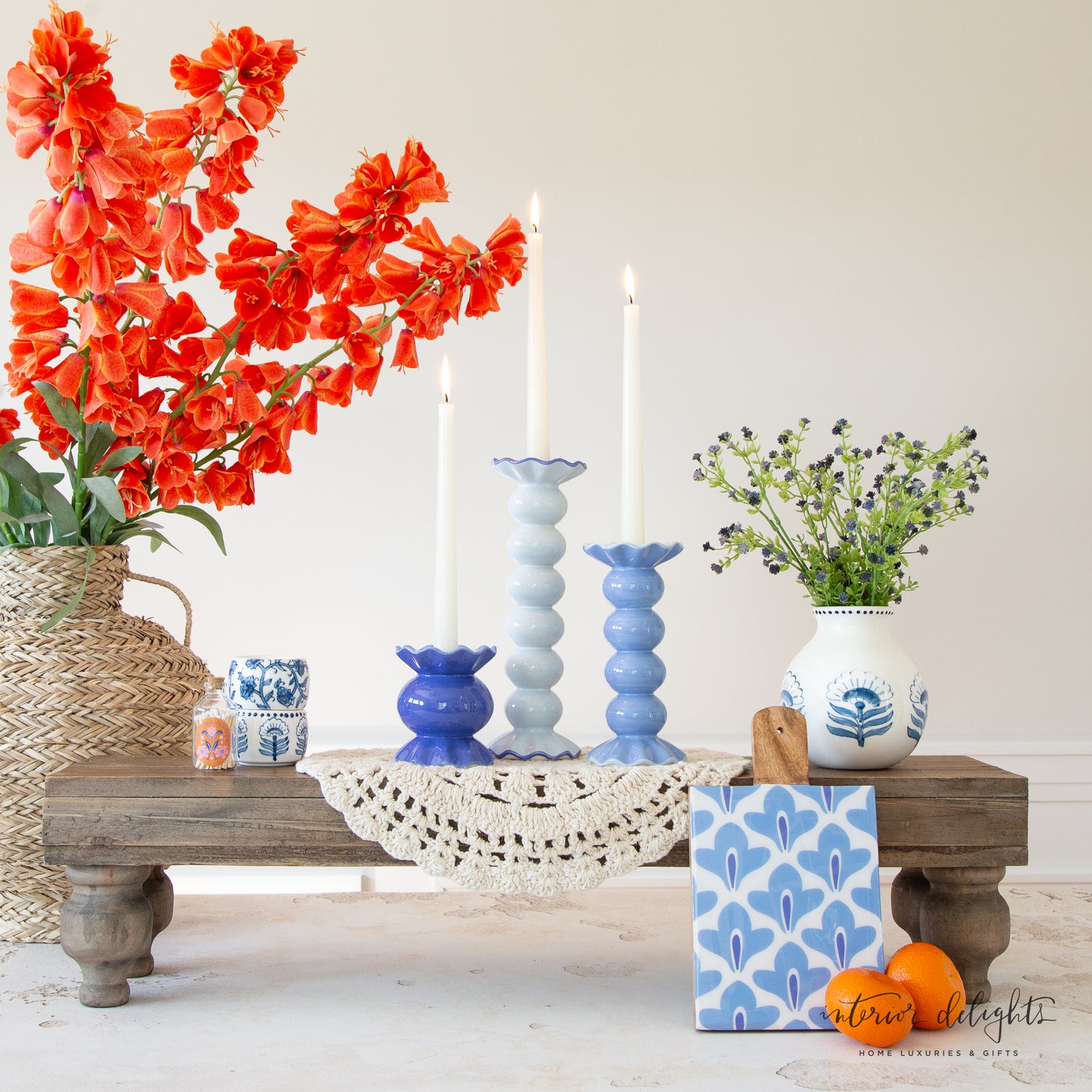 44" Orange Persian Lily displayed in an interior setting, adding dramatic color and beauty to the room.