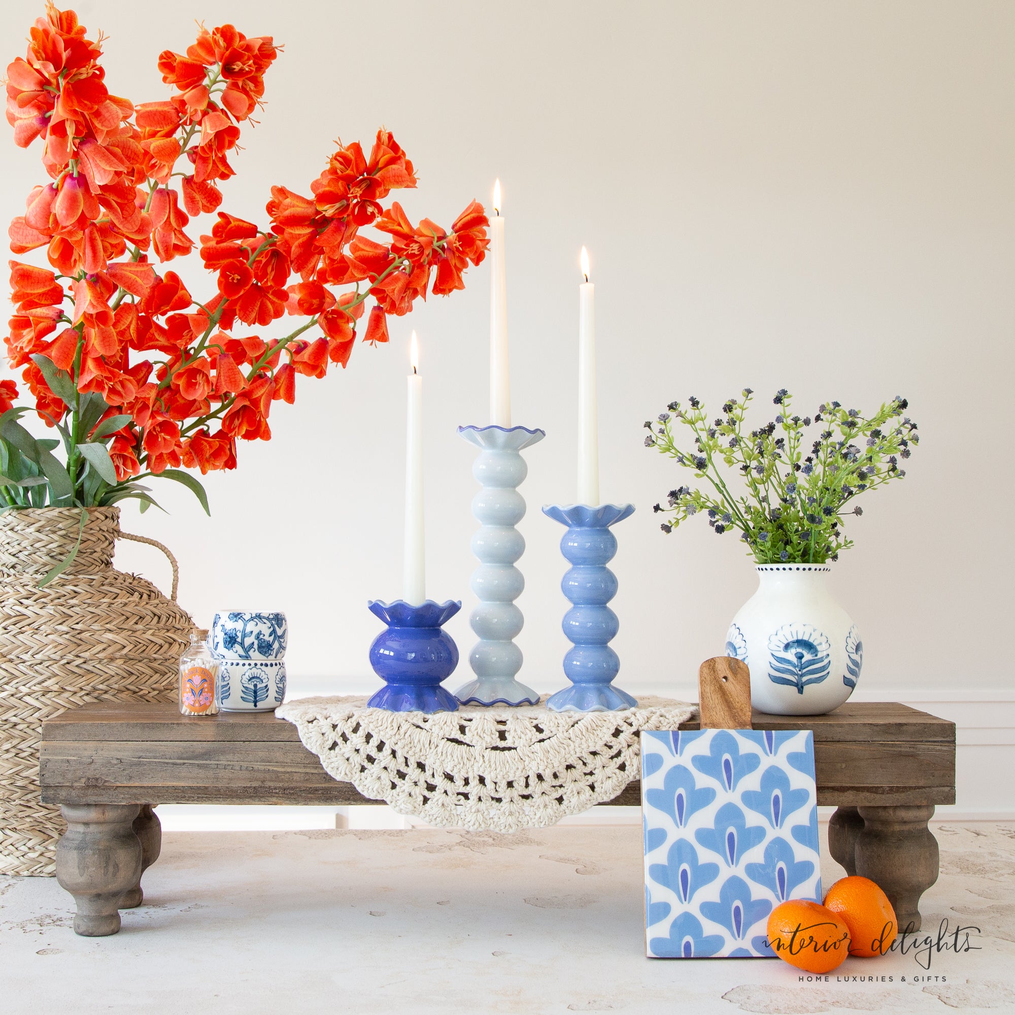 44" Orange Persian Lily displayed in an interior setting, adding dramatic color and beauty to the room.