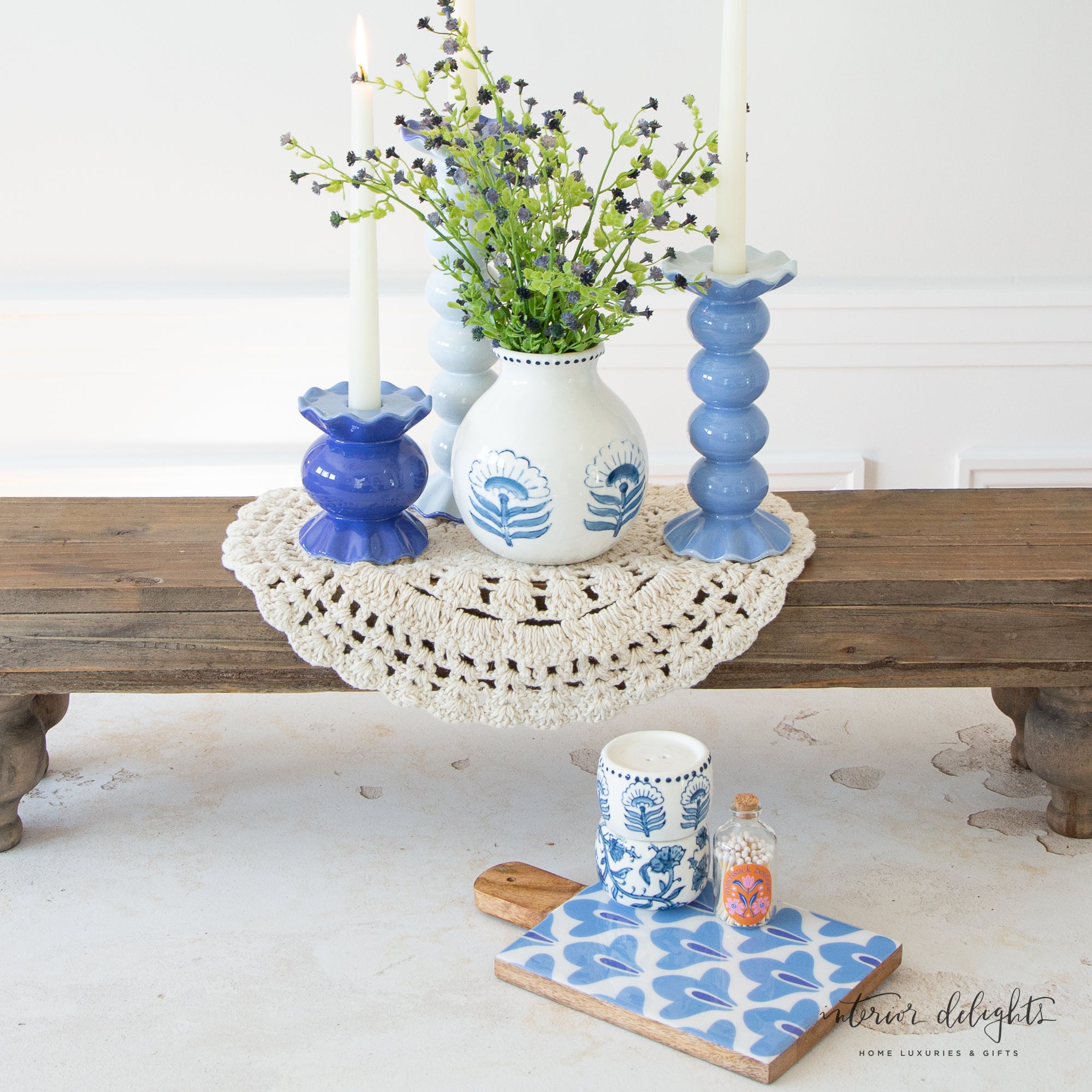 Iris Blue Sprout Wooden Board featuring a glossy blue floral block print design on a natural wood base, ideal for serving charcuterie and desserts.
