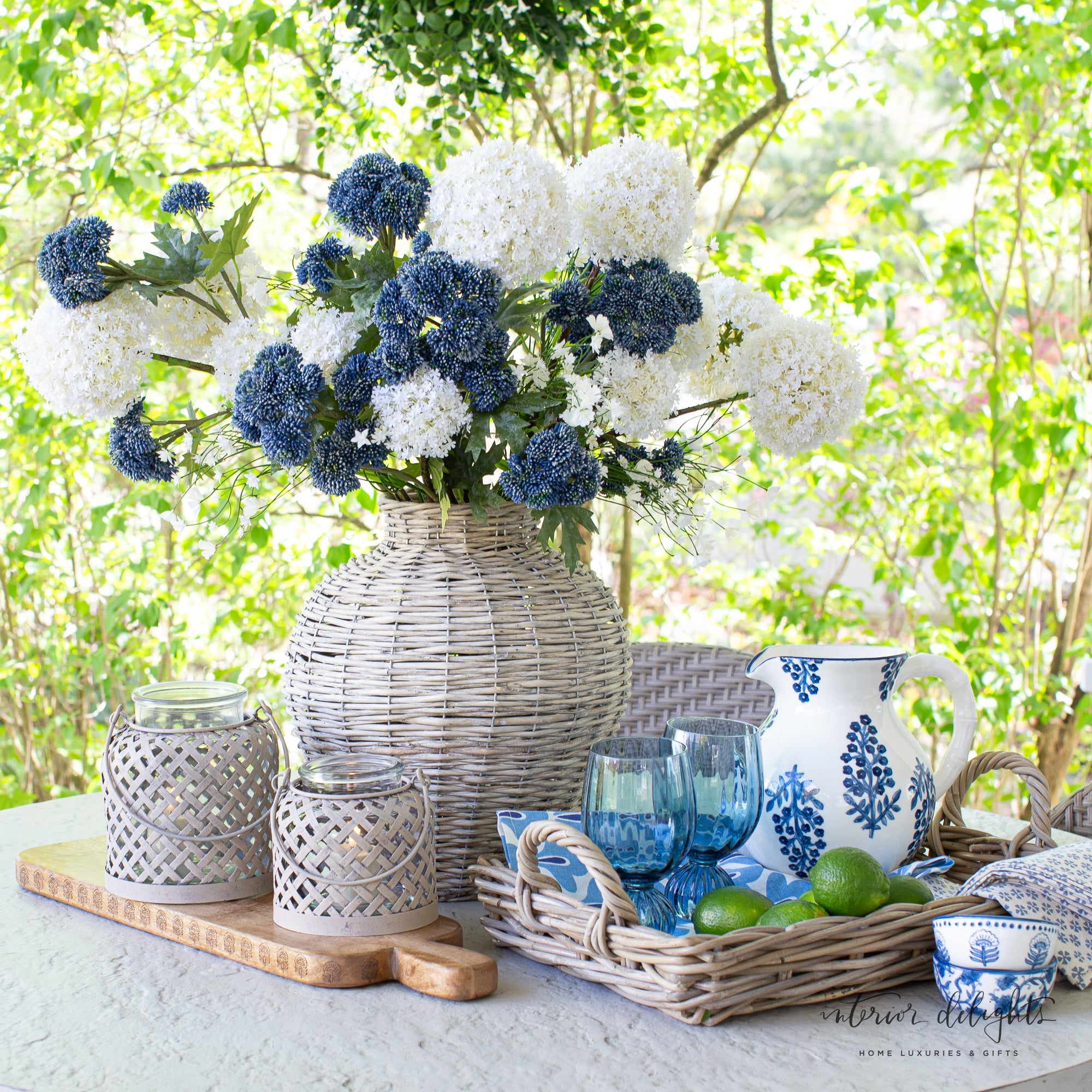 Small Nesting Willow Tray from the Set of 3, beautifully styled with fresh flowers, adding a touch of organic elegance.