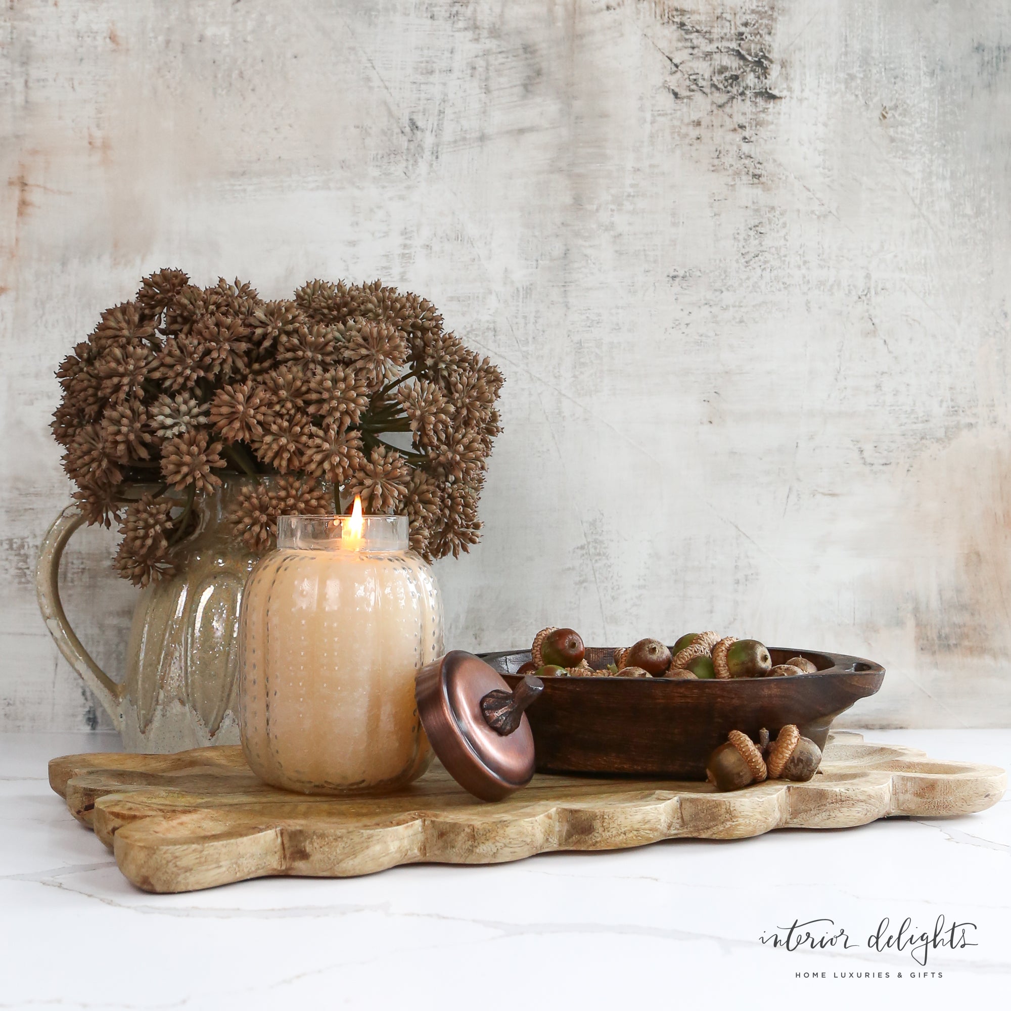 Mango Wood Tray with Scalloped Edge in a cozy home setting, showcasing its elegant design ideal for decorative display or serving treats.