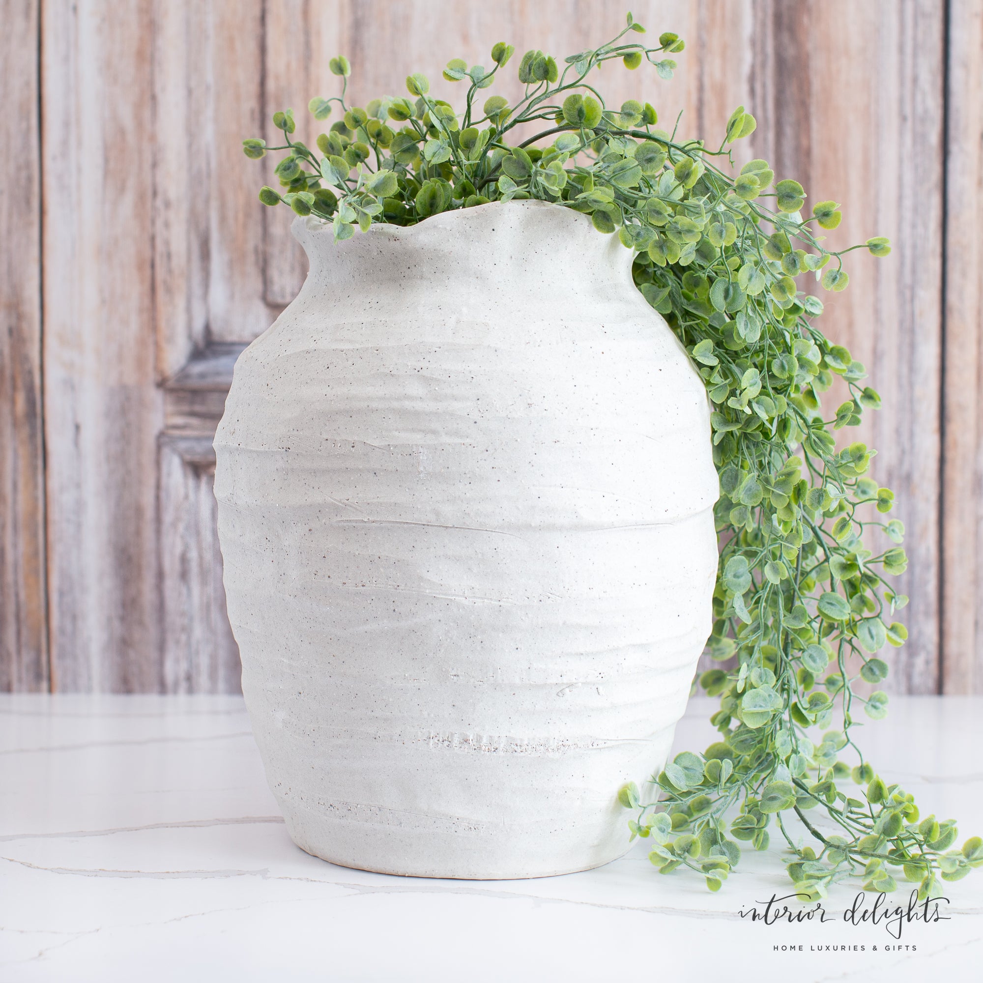Close-up view of the 12” Ivory Scalloped Top Stoneware Vase showing its ruffled rim and elegant shape
