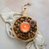 Carved mango wood bowl with handle beautifully showcasing its unique wood grain and rustic charm.