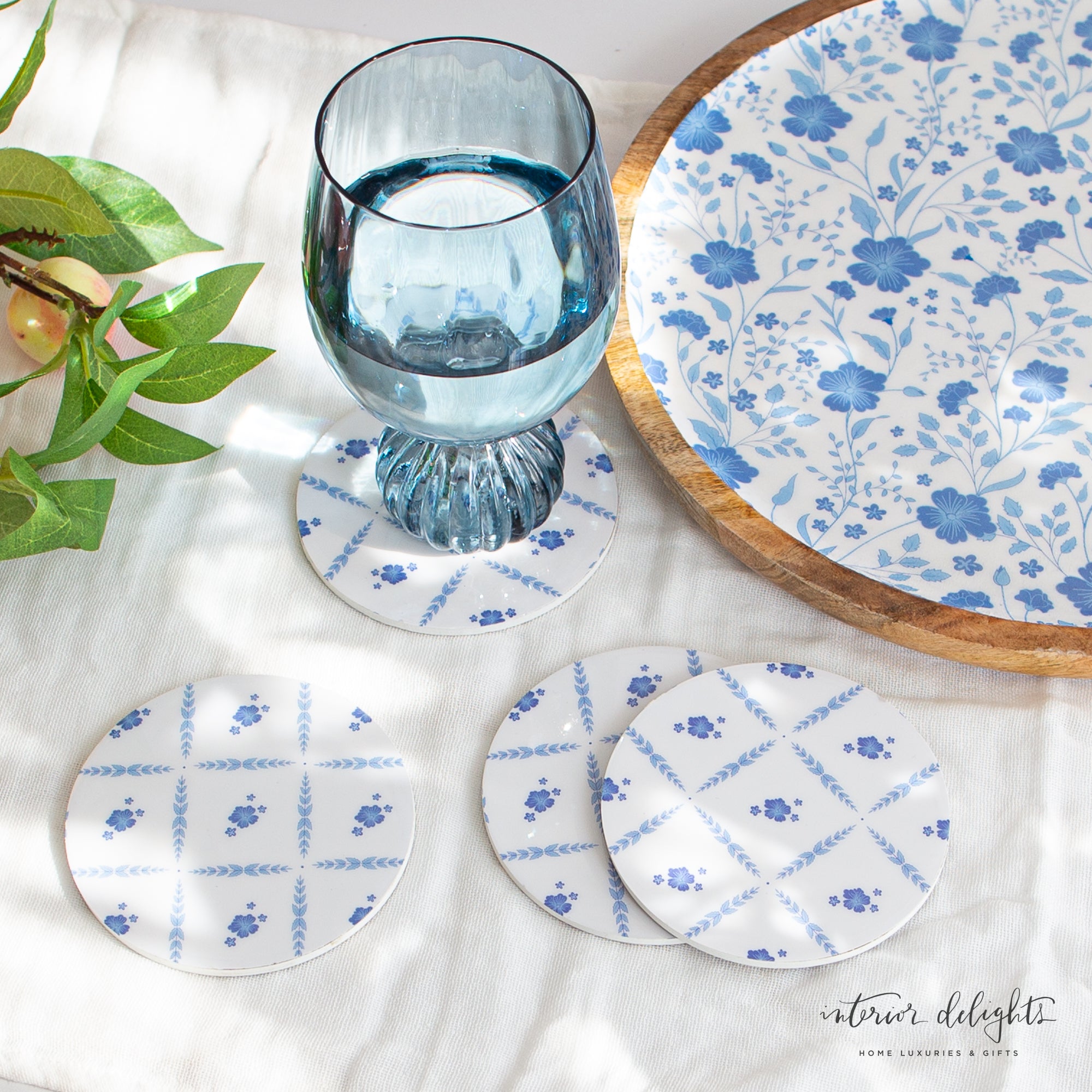 Close-up of a blue floral coaster from the Blue and White Floral Coasters collection, showcasing the detailed print and polished surface.