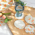 Printed Pattern Glass Coasters Set of 8 featuring 4 peach pattern and 4 beige lattice designs to protect your surfaces stylishly.