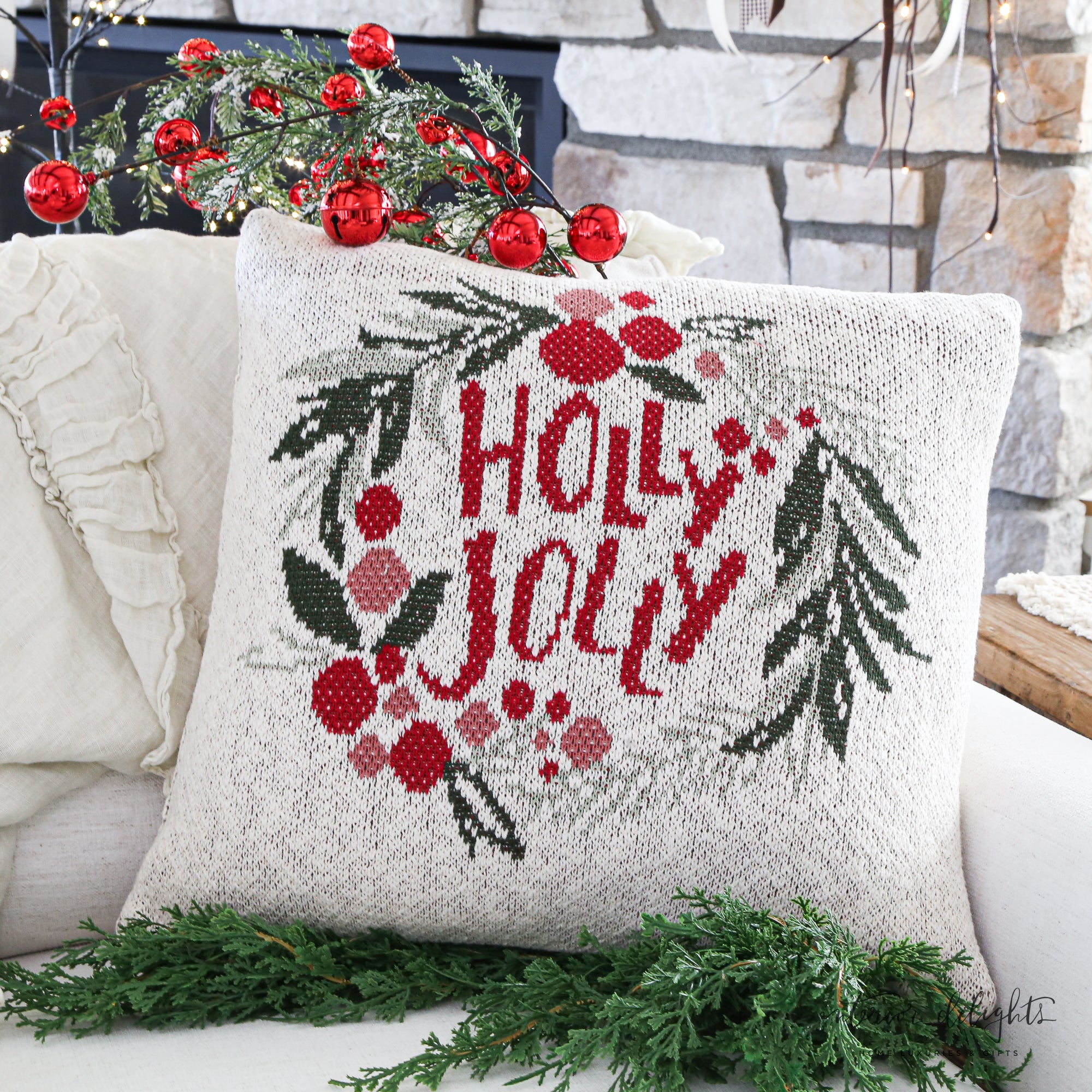 35" Snowy Pine Branch With Red Bells styled in a holiday centerpiece, adding elegance and cheer to seasonal displays.