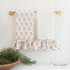 Molly Block Print Towel Set featuring delicate block print patterns and ruffle details on soft cotton fabric.