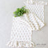 Bundle of Two Molly Table Runners featuring a delicate light brown floral pattern and ruffled edges, perfect for layering during dining or gatherings.
