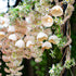 La Fleur LED Strand Lights featuring warm white bulbs with natural flower petal covers, perfect for creating a romantic summer ambiance.