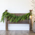 60" Natural Touch Norfolk Pine Garland showcasing lifelike greenery, perfect for holiday decorating.