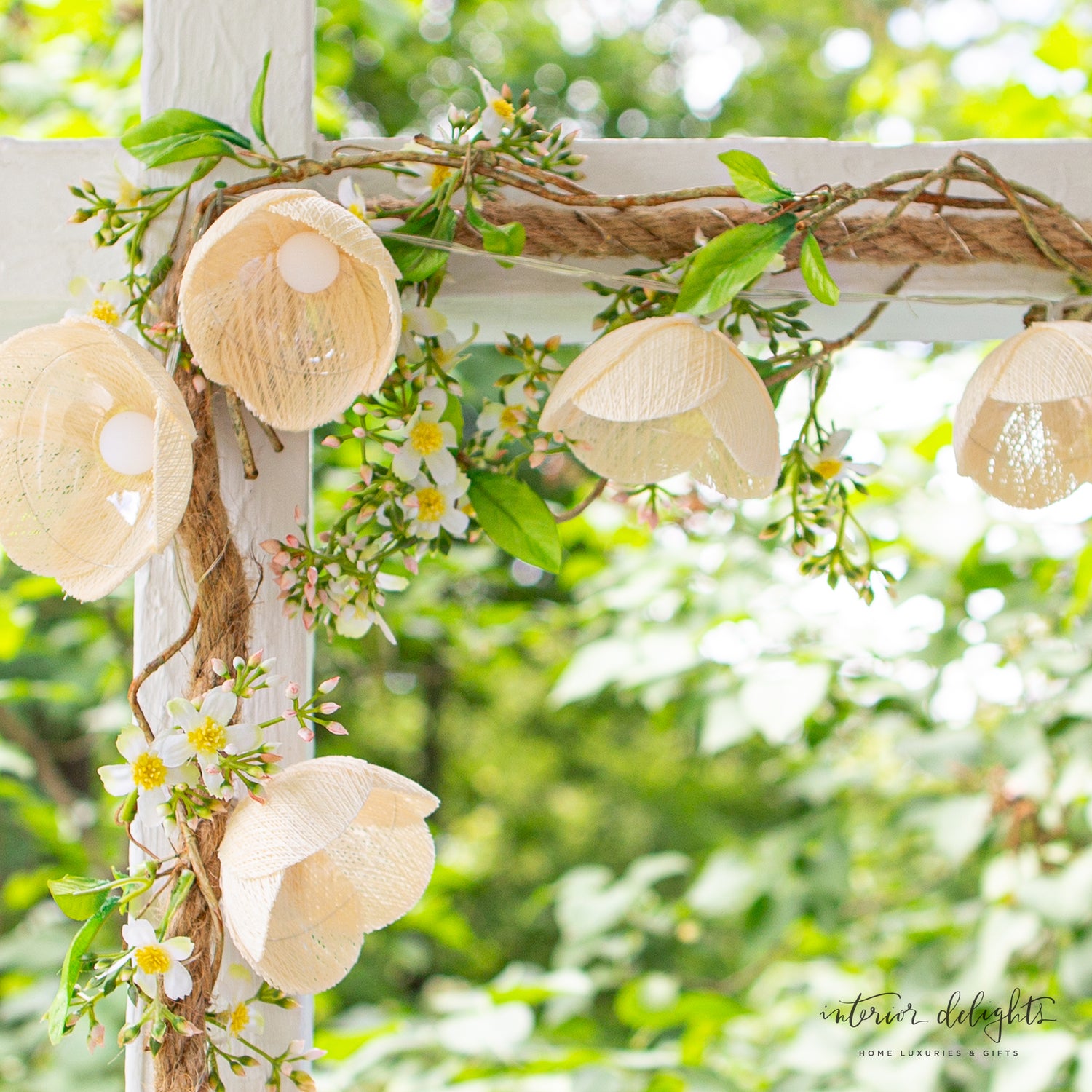 Close-up of La Fleur LED Strand Lights featuring a woven flower petal design, ideal for elegant summer table settings.