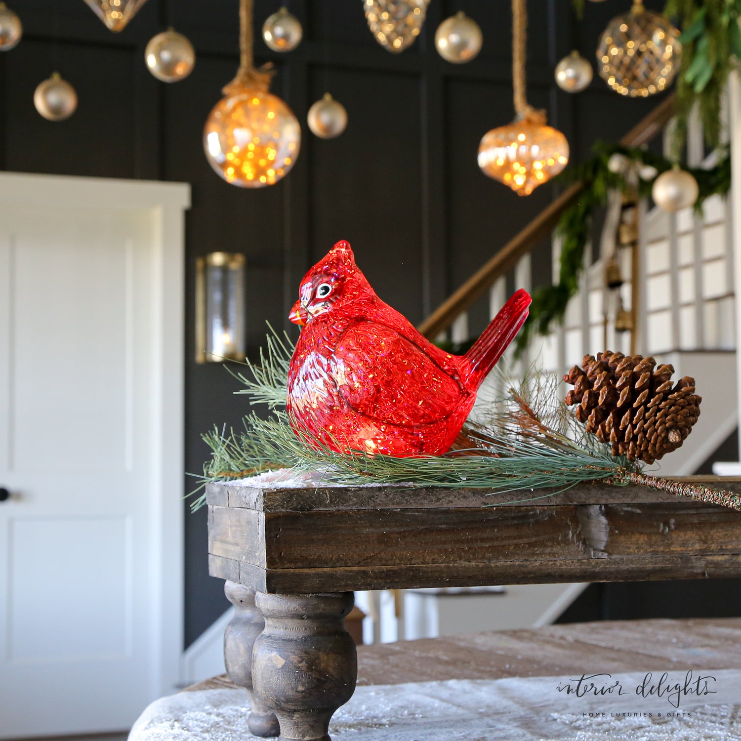 Vibrant Cardinal Snow Globe illuminating the festive atmosphere, ideal for mantels and tabletops.