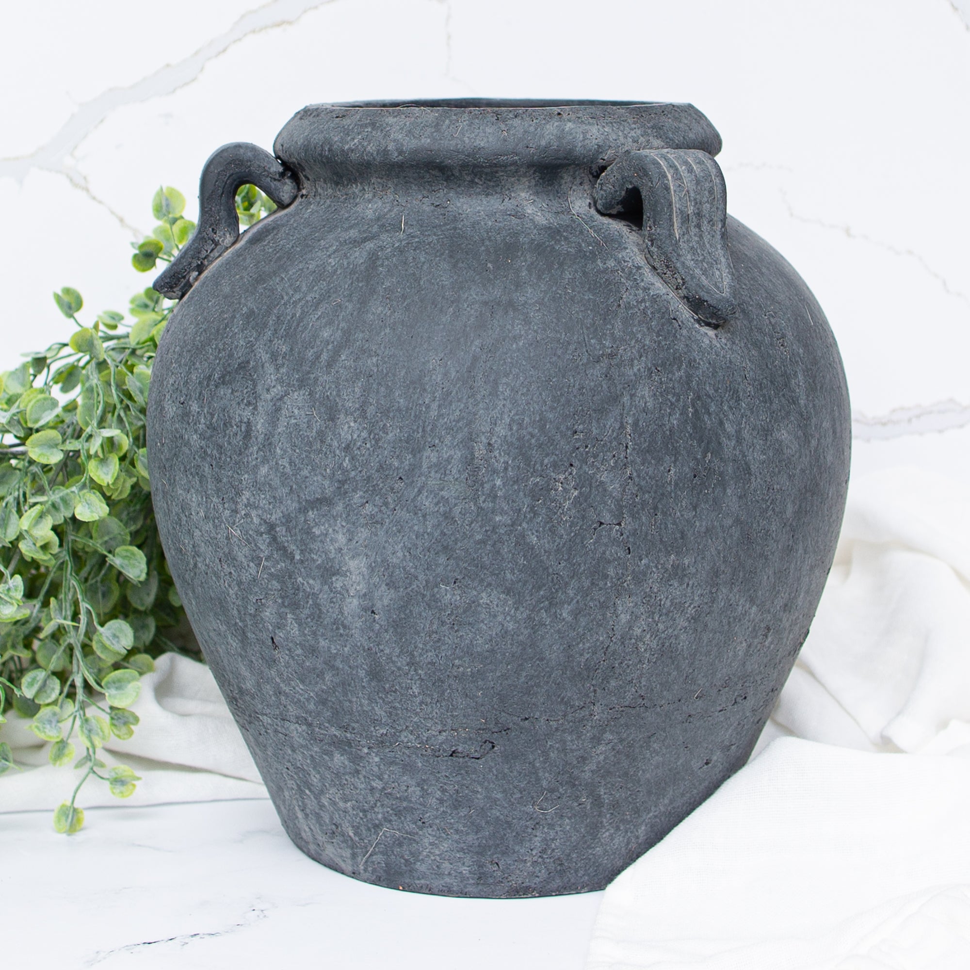 11" Charcoal Clay Pot showcasing its dark matte finish and three looped handles, perfect for home decor.