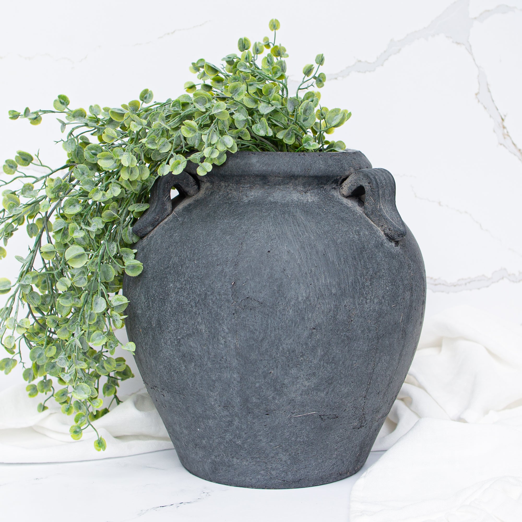 Stylish 11" Charcoal Clay Pot featuring sculptural looped handles, enhancing any transitional home decor.