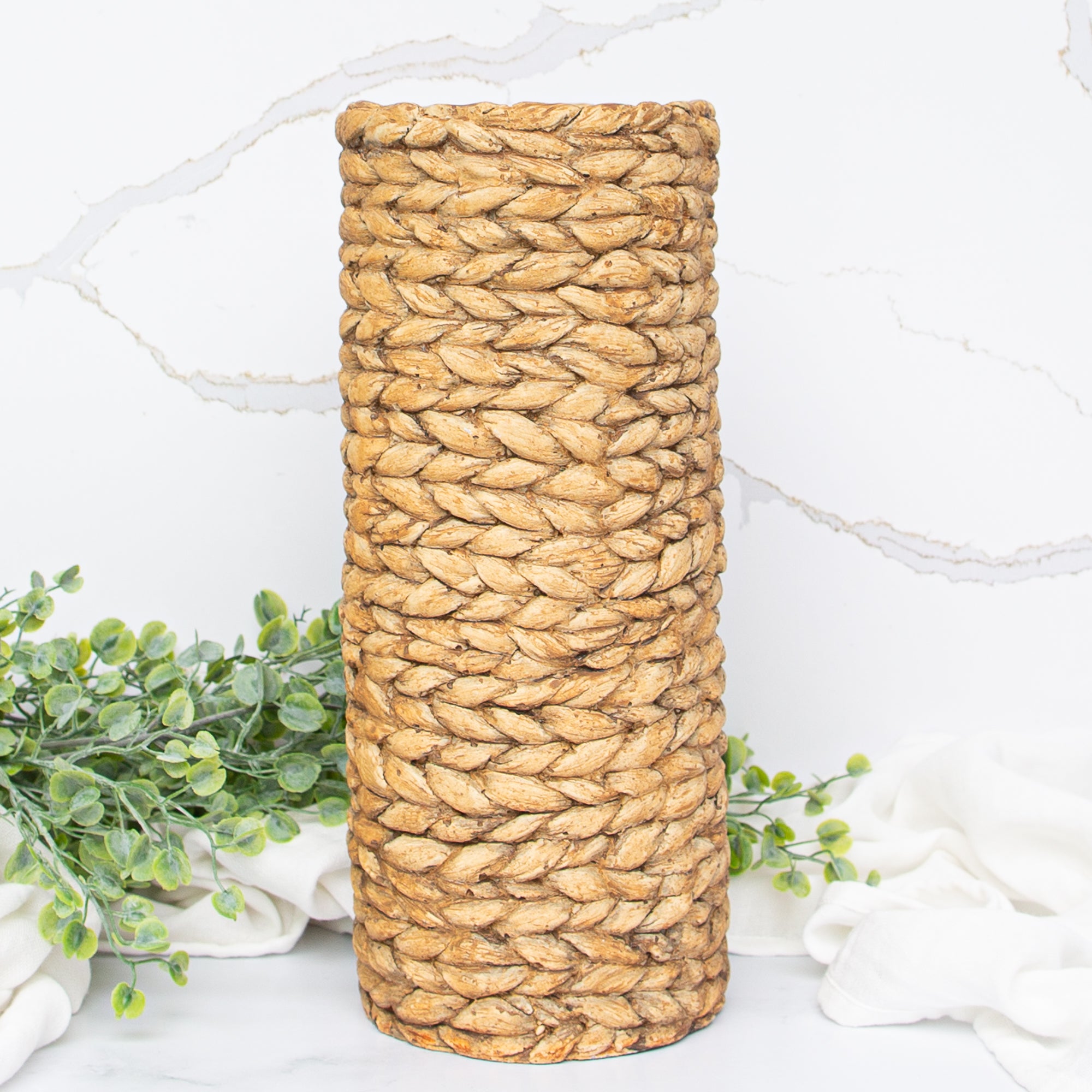 Stylish view of the 12.5" Tan Braided Pattern Cement Vase that adds charm and character to any space.