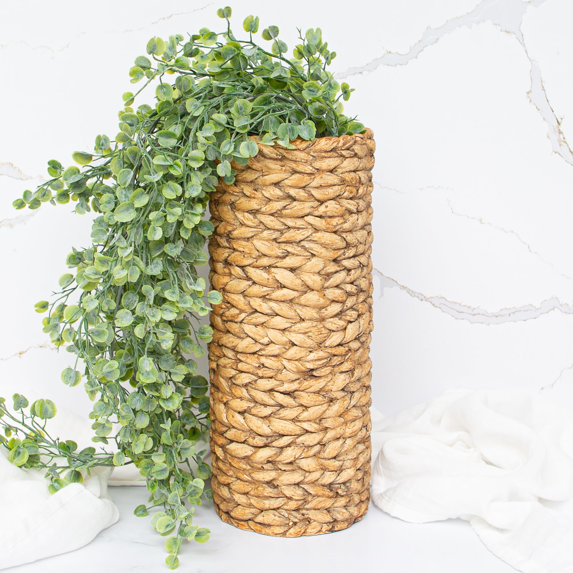 Close-up of the 12.5" Tan Braided Pattern Cement Vase highlighting its warm natural finish and durable cement material.