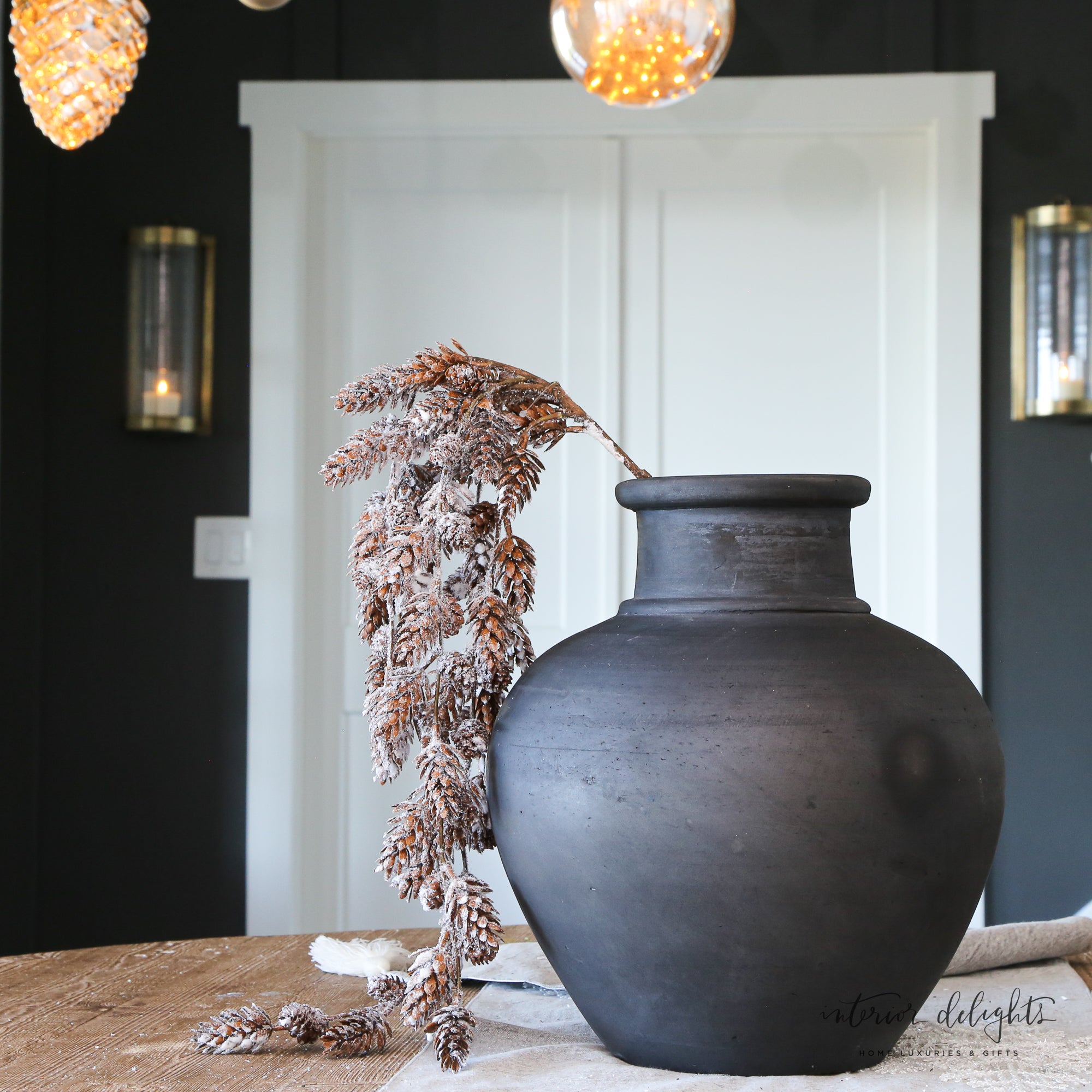 Close-up of the 46" Mini Snowy Pinecone Hanging Spray highlighting the charming wintery look perfect for festive arrangements.