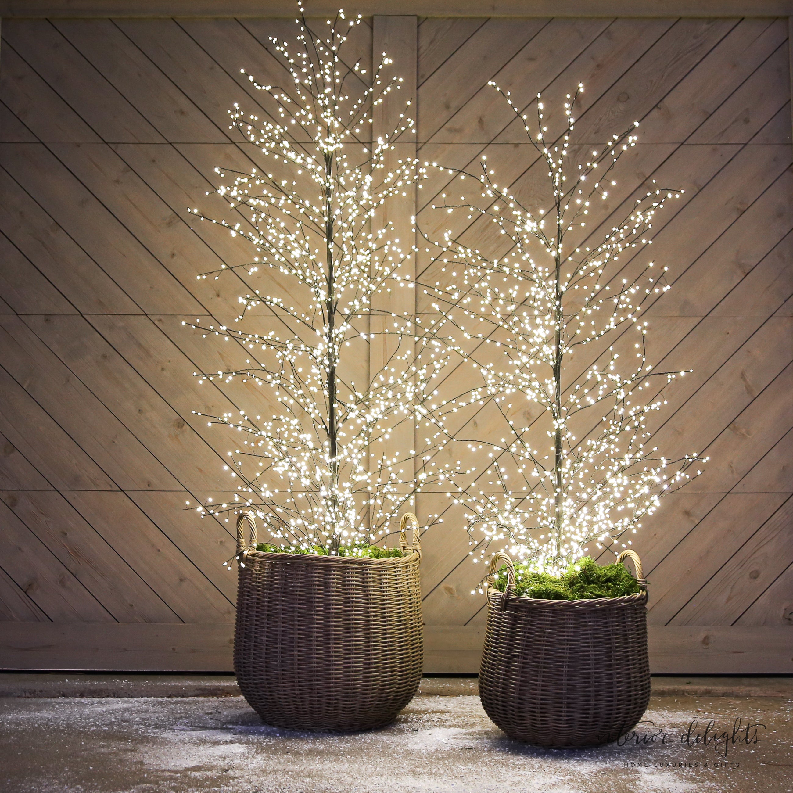 Stylish Round Willow Planter Baskets - Set of 2 with side handles, ideal for enhancing patio and porch aesthetics.