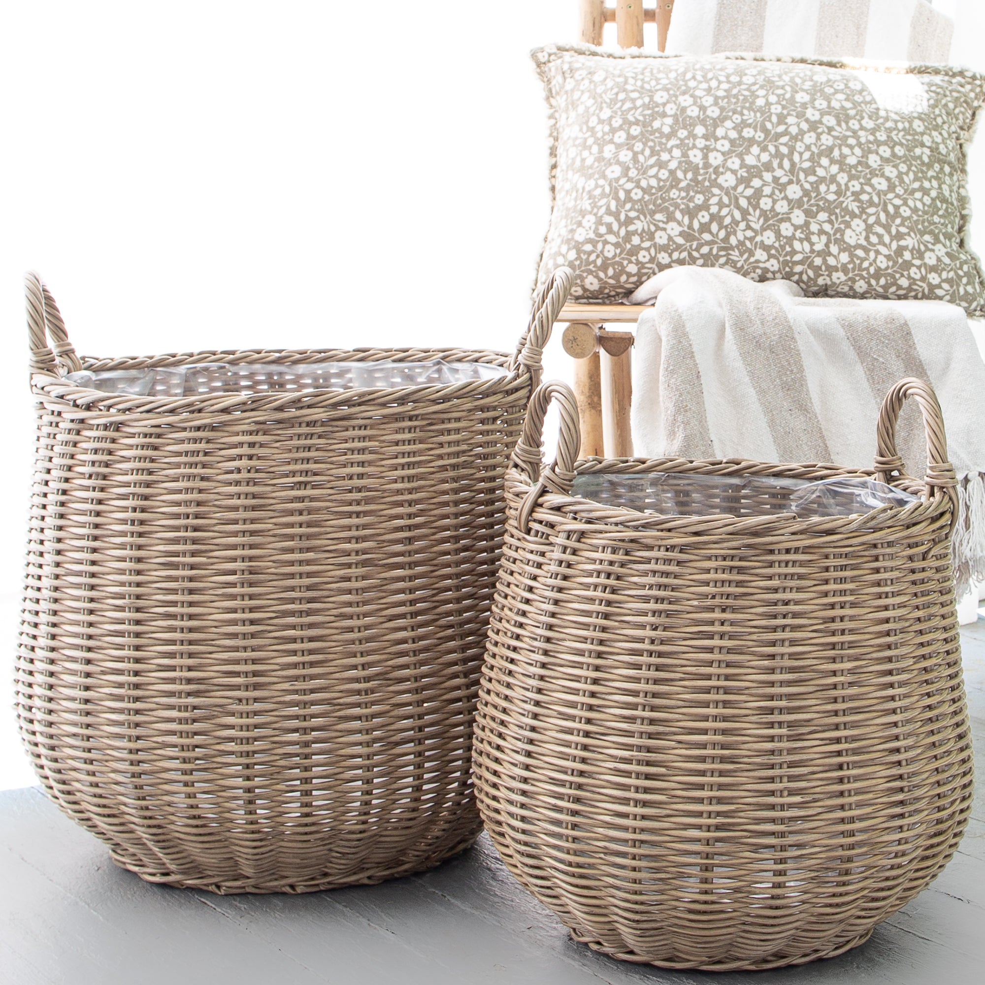 Close-up view of Round Willow Planter Baskets - Set of 2 highlighting the woven texture and cottage-style appeal for garden decor.
