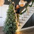 Game Changer Micro LED Tree Bunch glowing beautifully on a 7-foot Christmas tree for stunning holiday decor.