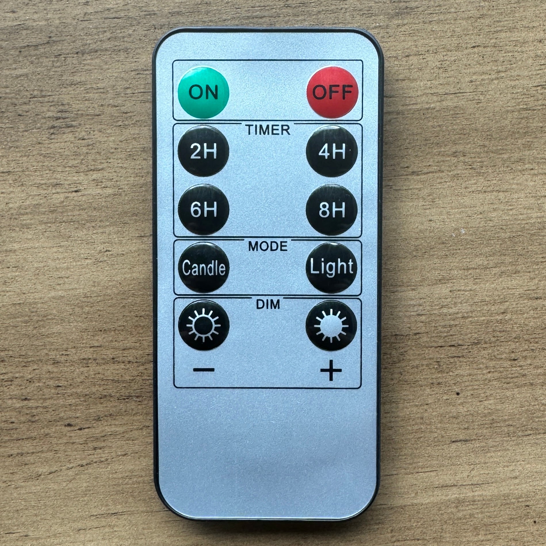 REMOTE CONTROL for flameless candles with timer and dimming features, perfect for setting ambiance.